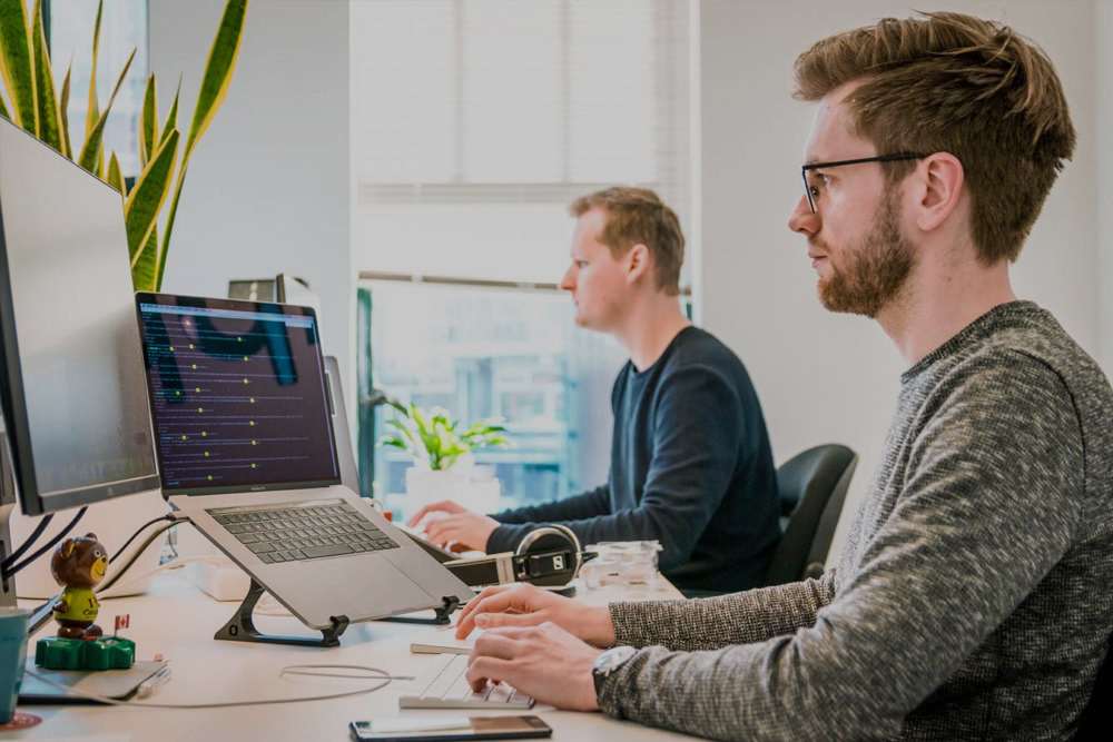How do landing page builds differ when handled by a web design agency?
